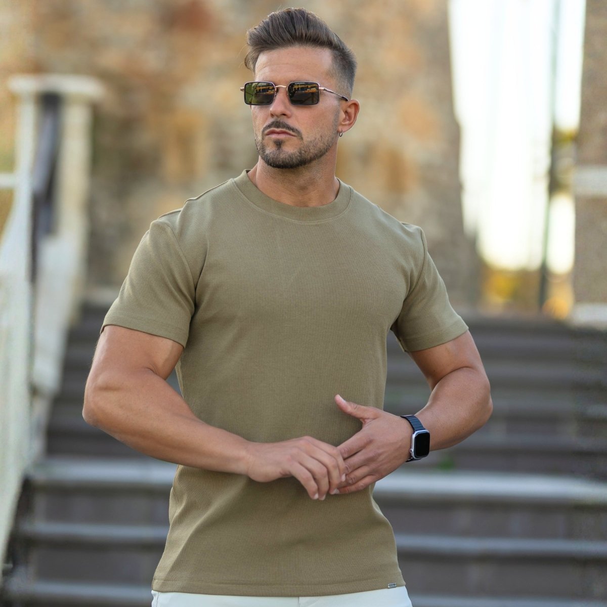 muscular bodybuilder man wearing stylish essential t-shirt that fits biceps