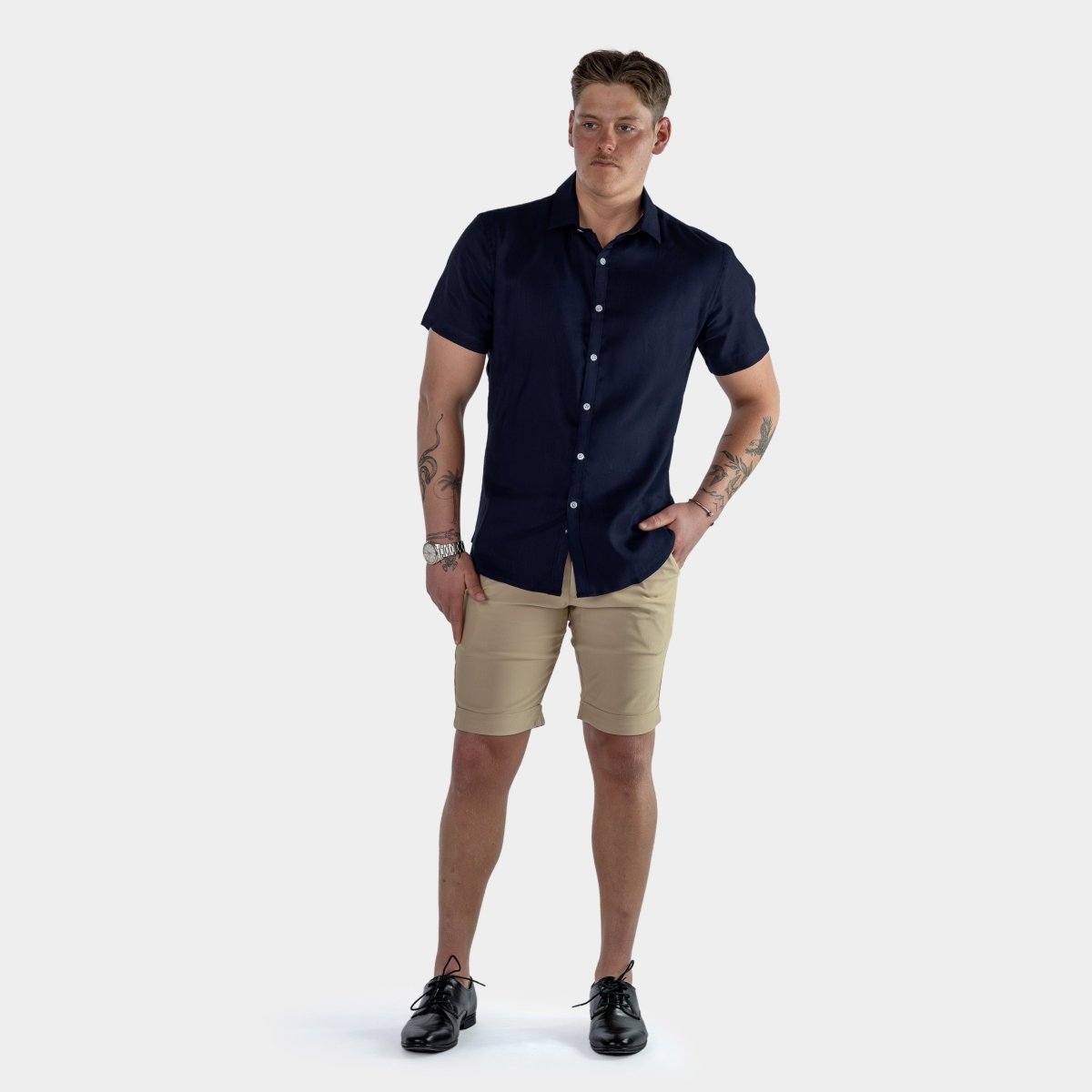 Navy Short Sleeve Shirt with brown chino shorts 