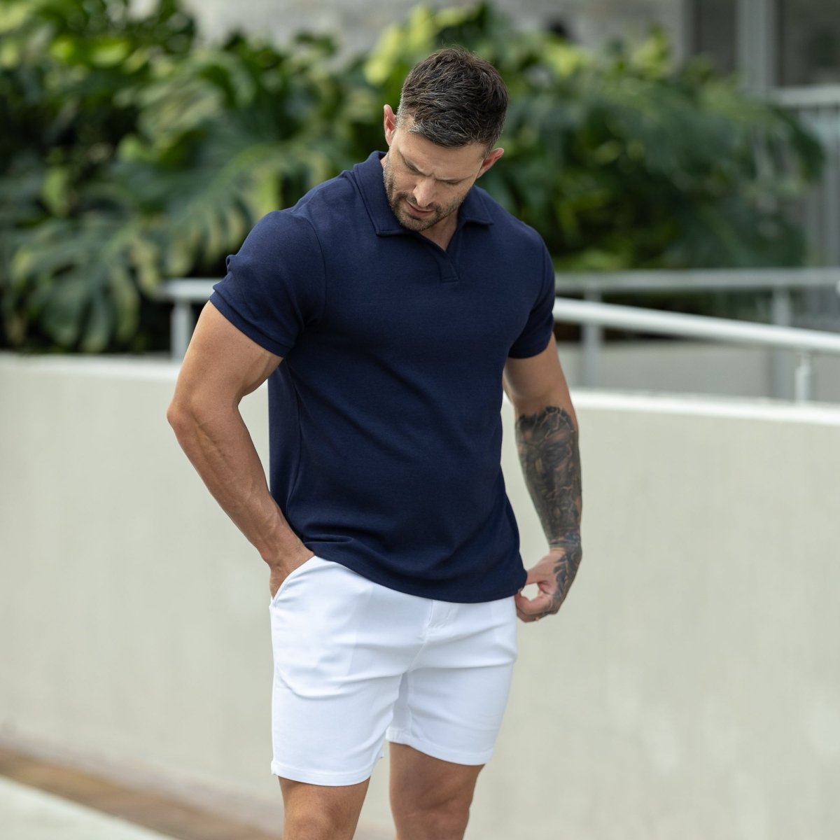 Navy Polo Shirt with white chino shorts outfit ideas for men summer 2025