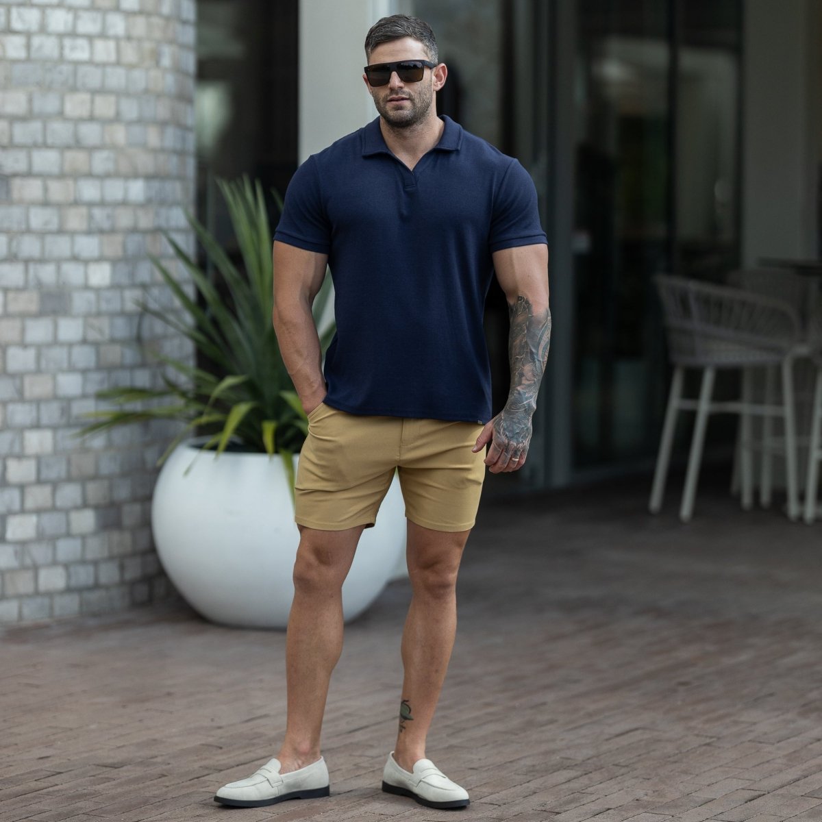 Mens summer date night outfit ideas navy polo brown chino shorts