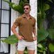 Men’s oak rayon knit polo shirt with 5” inseam cream chino shorts summer neutrals outfit style guide