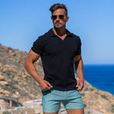 Best Summer Style Smart Casual Outfit with black polo shirt and green chino shorts