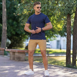Mens Summer Old Money Outfit Navy T-Shirt with beige chino shorts