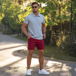Man wearing Grey Slim Fit Polo with Burgundy Casual Shorts Outfit by Kojo Fit